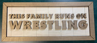 
              This House Runs on Wrestling Sign
            